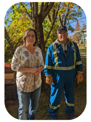 Two volunteers doing yardwork on NOVA Day of Caring