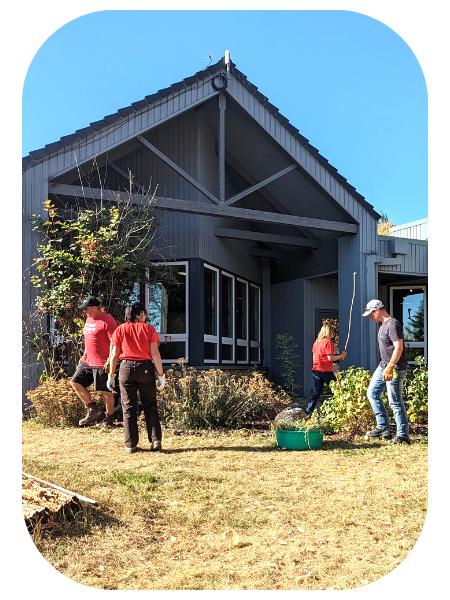 NOVA volunteers cleaning yard at Kerrywood Nature Centre